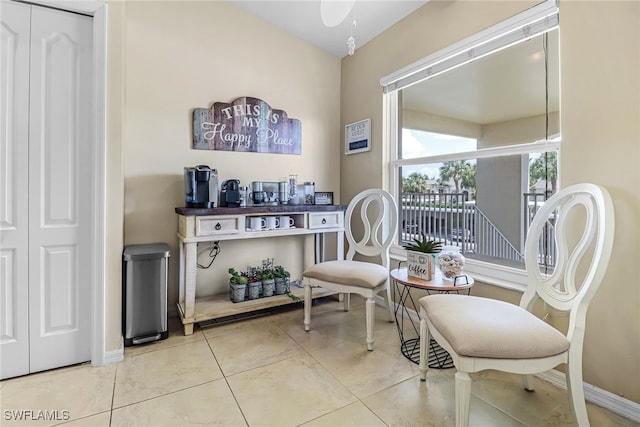 sitting room featuring tile patterned floors