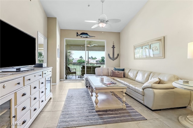 tiled living room featuring ceiling fan