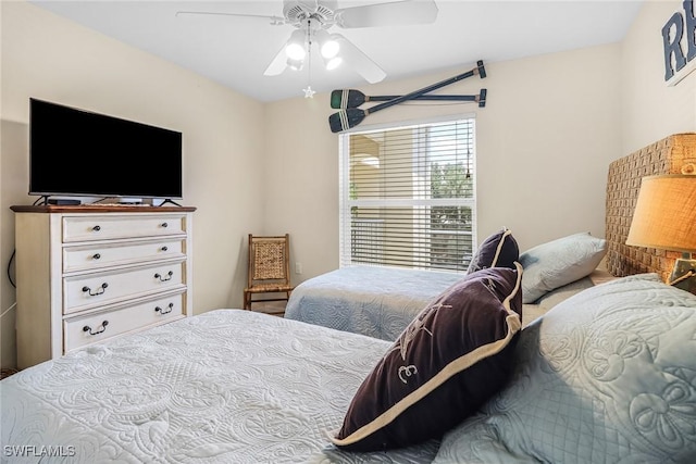 bedroom featuring ceiling fan