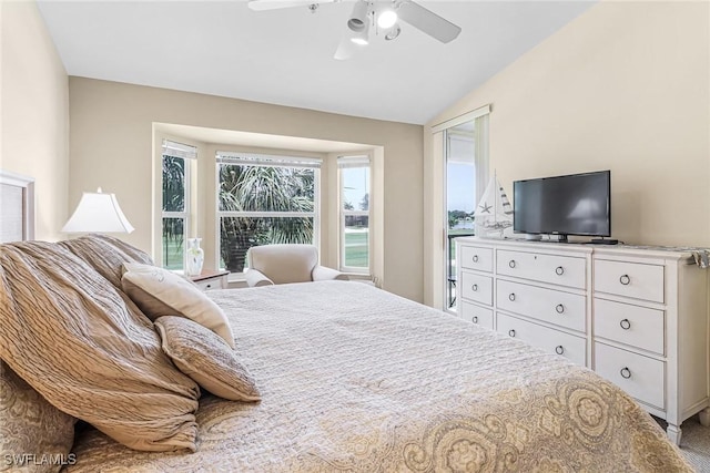 bedroom featuring lofted ceiling and ceiling fan