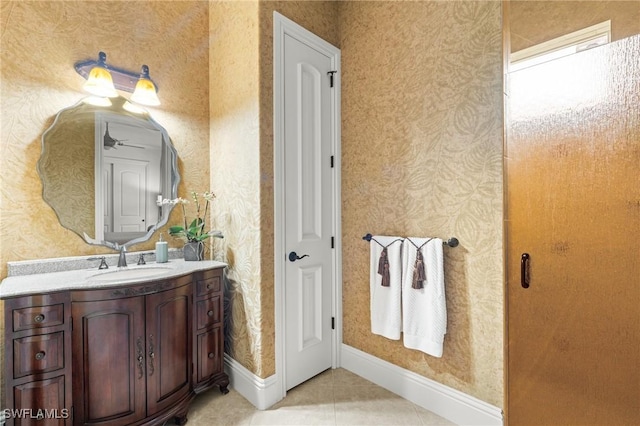 bathroom with vanity and tile patterned flooring