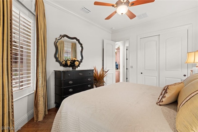 bedroom featuring dark hardwood / wood-style flooring, ornamental molding, a closet, and ceiling fan