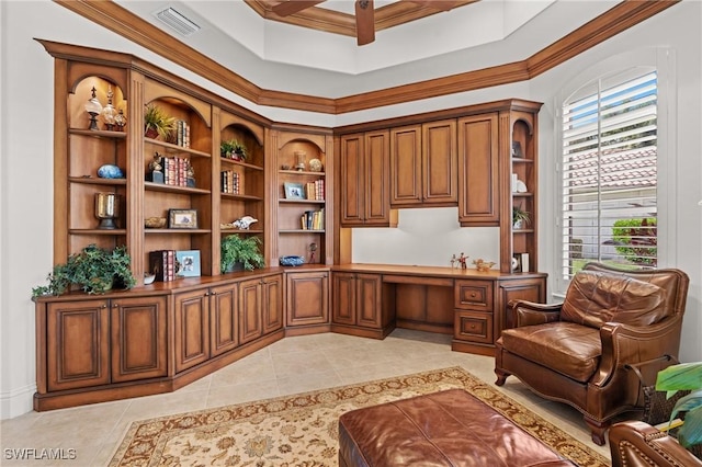 tiled office space featuring built in desk and ornamental molding