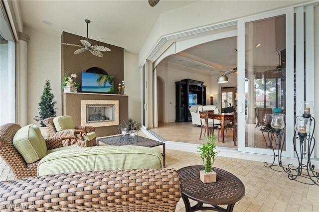 living room featuring ceiling fan