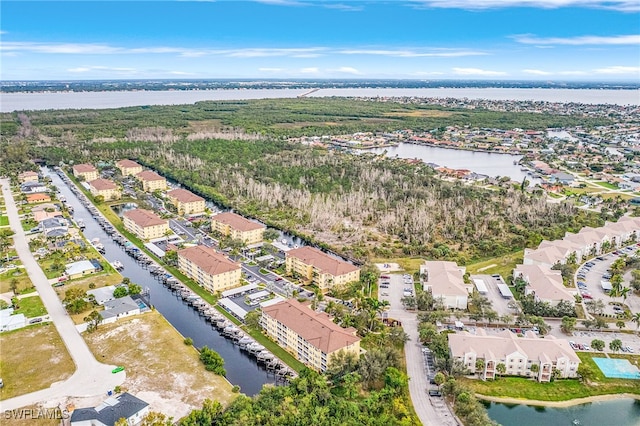 bird's eye view with a water view