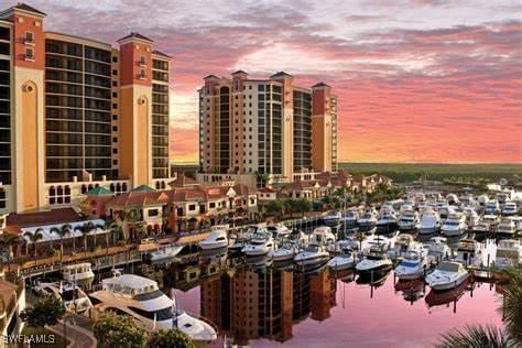 property's view of city featuring a water view