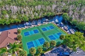 birds eye view of property featuring a water view