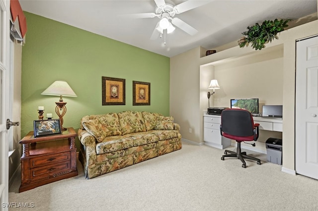 office area featuring light colored carpet and ceiling fan