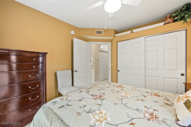 bedroom featuring ceiling fan and a closet