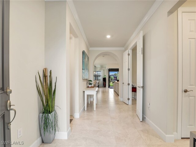 corridor featuring ornamental molding