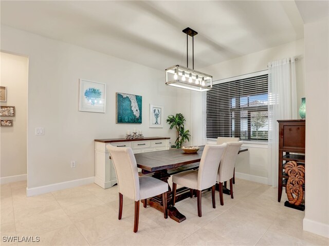 dining room with light tile patterned floors