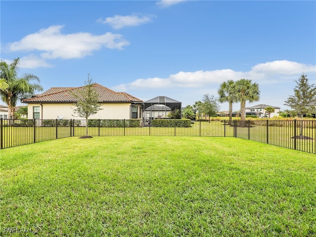 view of yard with a lanai