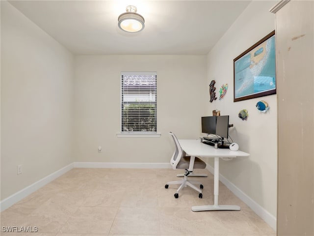 office space featuring light tile patterned floors