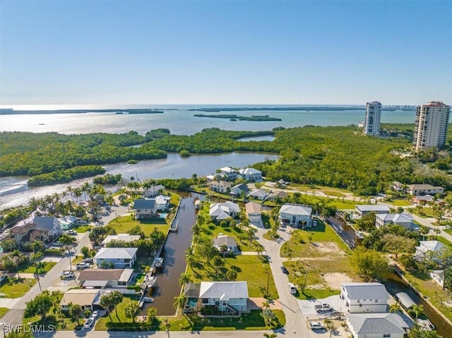 drone / aerial view with a water view