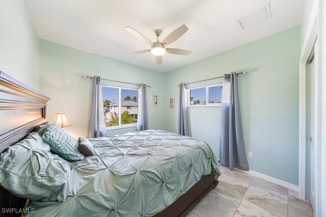 bedroom featuring ceiling fan