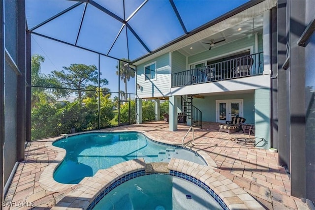 view of pool featuring an in ground hot tub, ceiling fan, french doors, and a patio