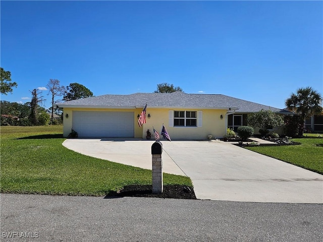 single story home featuring a garage and a front yard