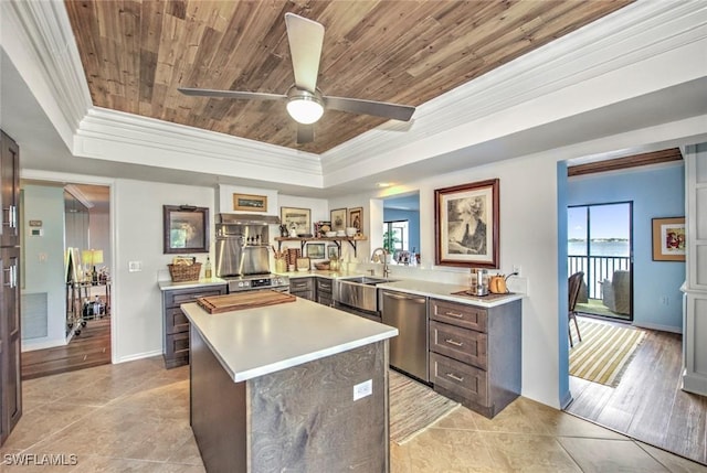 kitchen featuring light tile patterned floors, plenty of natural light, stainless steel dishwasher, and wood ceiling