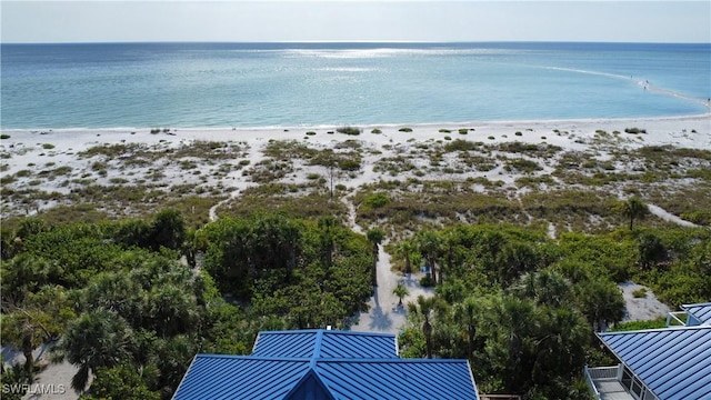 aerial view featuring a beach view and a water view