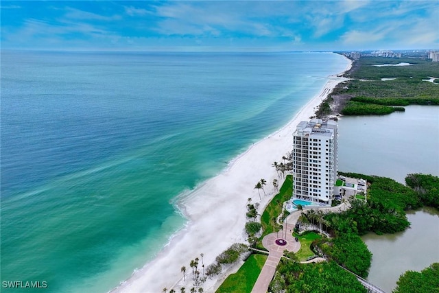 bird's eye view with a beach view and a water view