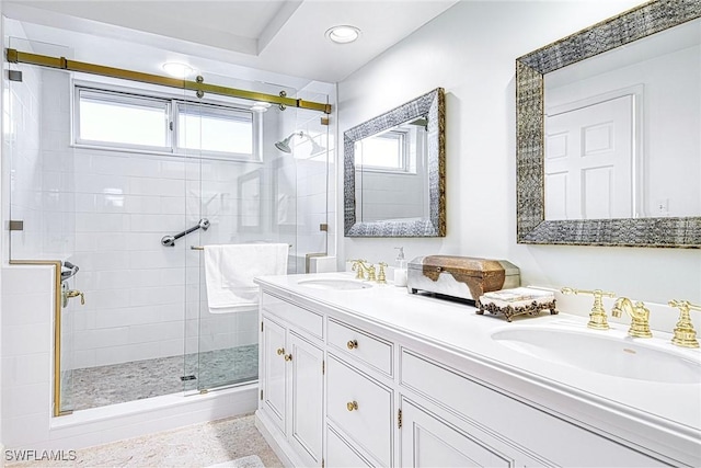 bathroom with vanity and an enclosed shower