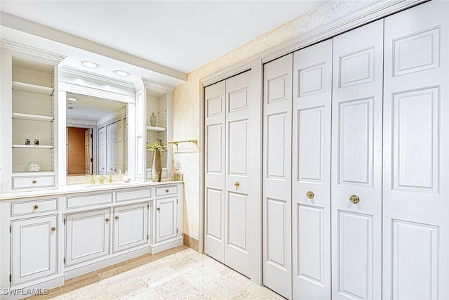 bathroom featuring vanity and built in features