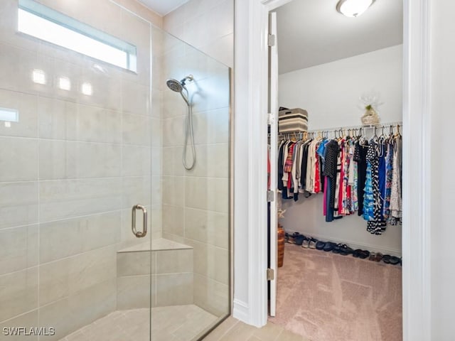 bathroom featuring an enclosed shower