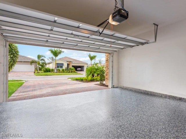 garage featuring a garage door opener