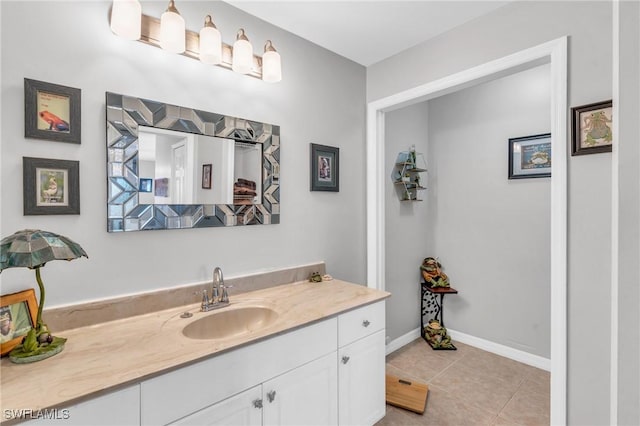 bathroom with vanity and tile patterned floors