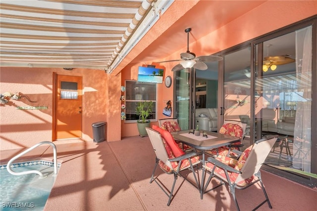 view of patio with ceiling fan