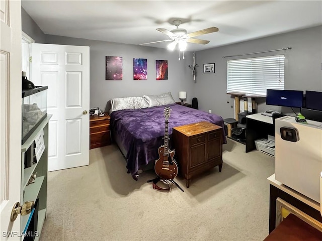 bedroom with light carpet and ceiling fan