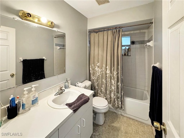 full bathroom featuring vanity, toilet, and shower / bath combo with shower curtain