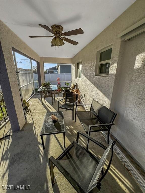 view of patio / terrace with ceiling fan