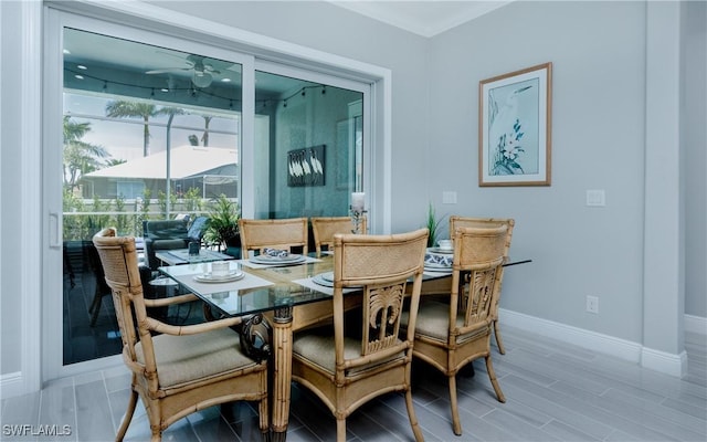 dining space featuring ceiling fan