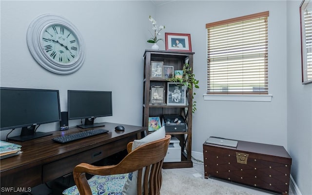 office space with light colored carpet