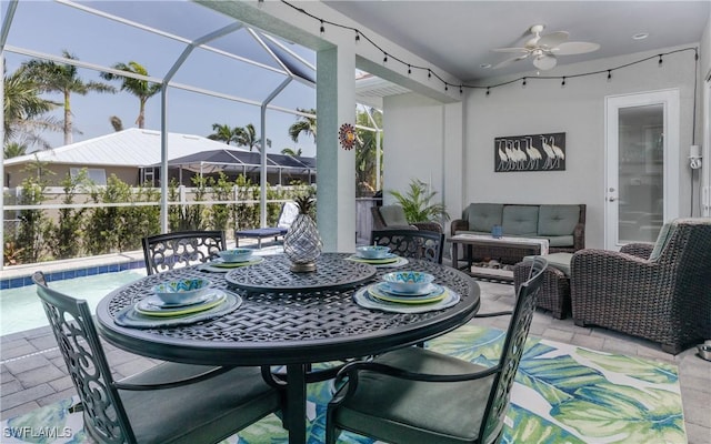 view of patio / terrace featuring an outdoor living space, a lanai, a pool, and ceiling fan