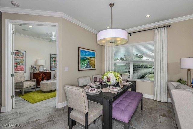 dining space featuring ornamental molding