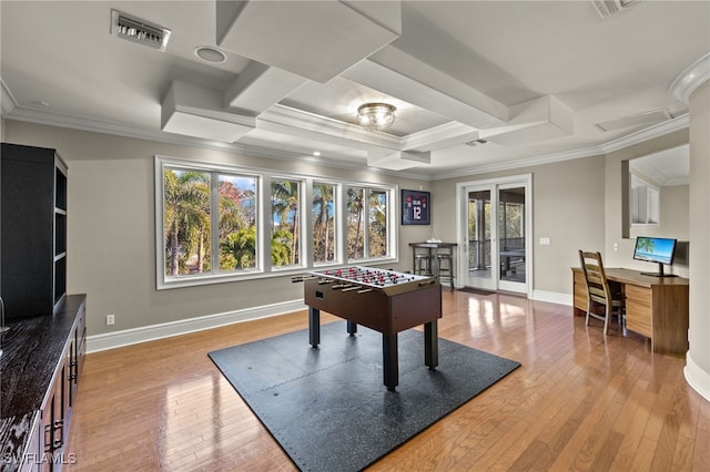 game room with crown molding, hardwood / wood-style floors, coffered ceiling, baseboards, and french doors