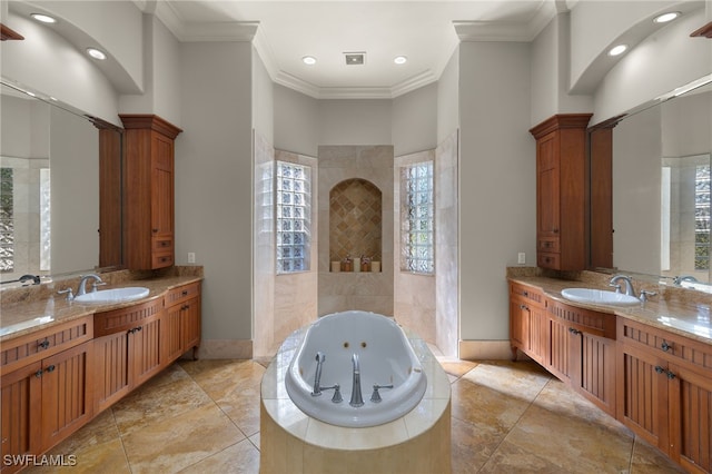 bathroom featuring ornamental molding, a jetted tub, two vanities, walk in shower, and recessed lighting