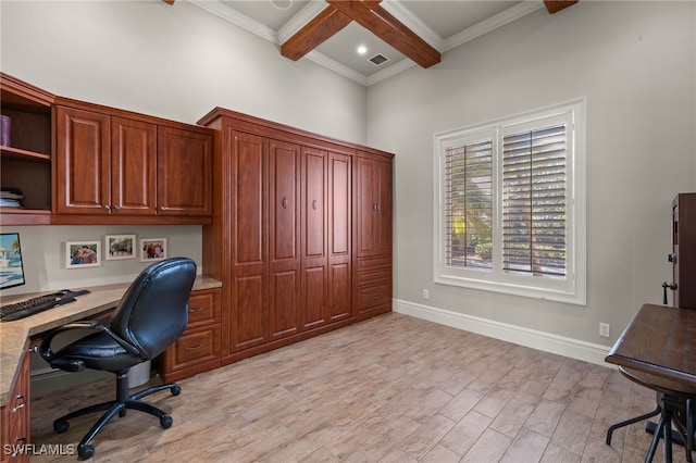 office area with coffered ceiling, built in desk, light wood-type flooring, beamed ceiling, and a towering ceiling