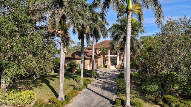 view of front of property with a front lawn