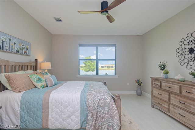 6217 Harmony Dr, Ave Maria, FL 34142 - bedroom featuring visible vents, baseboards, and a ceiling fan