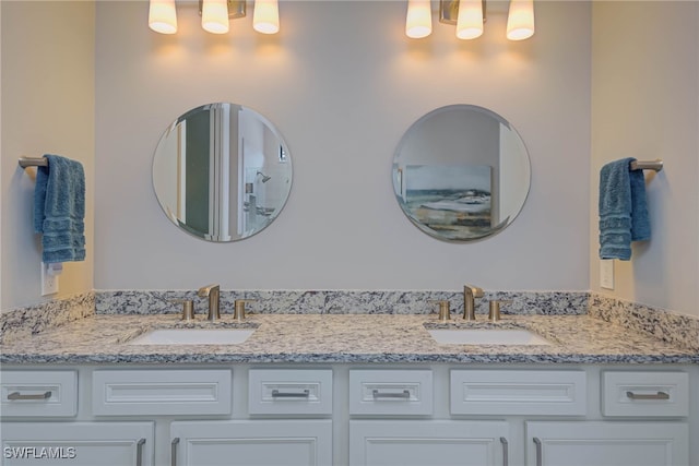 6217 Harmony Dr, Ave Maria, FL 34142 - bathroom with double vanity and a sink