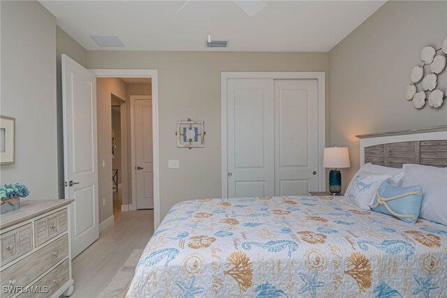 6217 Harmony Dr, Ave Maria, FL 34142 - bedroom featuring a closet, a ceiling fan, and visible vents