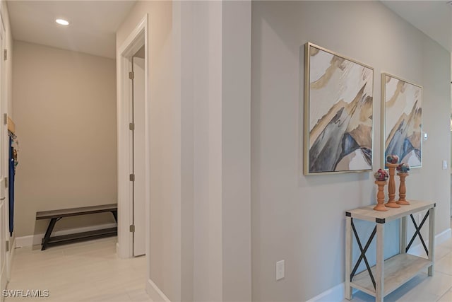 6217 Harmony Dr, Ave Maria, FL 34142 - hallway with light tile patterned floors, baseboards, and recessed lighting