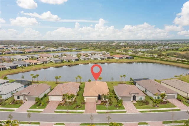 6217 Harmony Dr, Ave Maria, FL 34142 - bird's eye view featuring a residential view and a water view