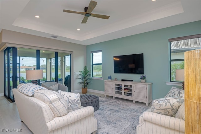 6217 Harmony Dr, Ave Maria, FL 34142 - living area featuring recessed lighting, visible vents, a tray ceiling, and ceiling fan