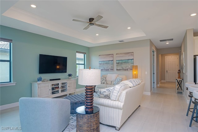 6217 Harmony Dr, Ave Maria, FL 34142 - living area with a raised ceiling, baseboards, a ceiling fan, and recessed lighting