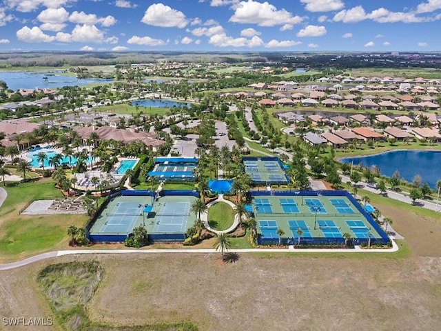 6217 Harmony Dr, Ave Maria, FL 34142 - bird's eye view featuring a residential view and a water view