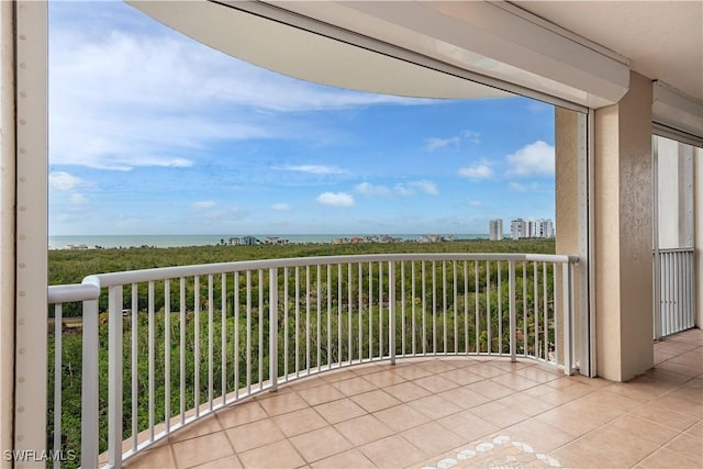 balcony featuring a water view